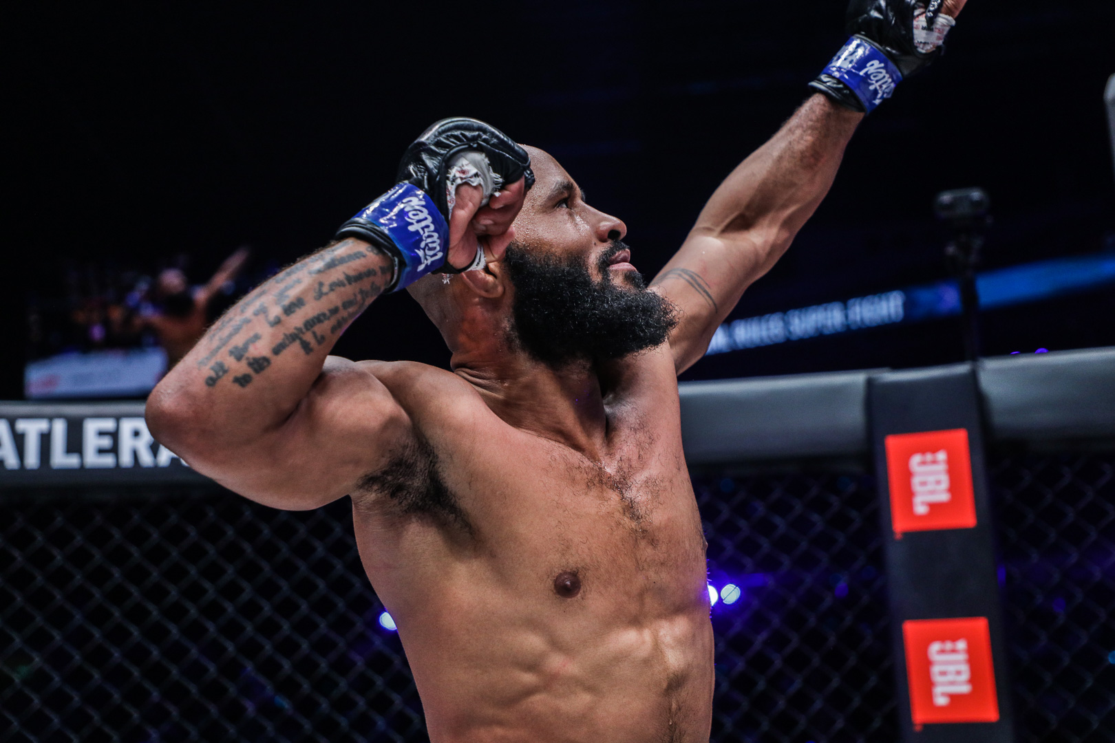Demetrious Johnson celebrates his victory over Rodtang Jitmuangnon after their mixed rules superfight at ONE X