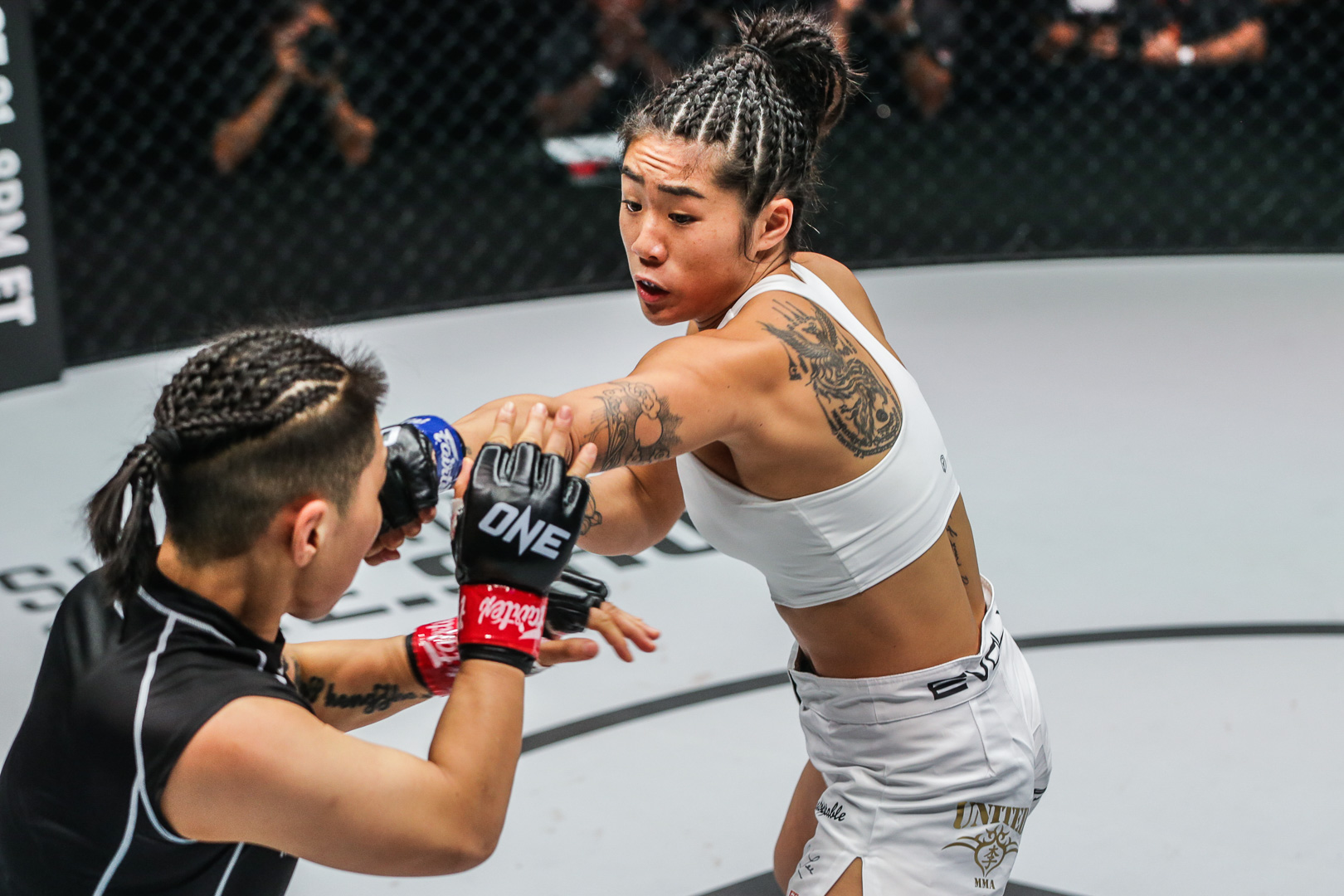 Angela Lee throws a punch on Xiong Jing Nan at ONE on Prime Video 2