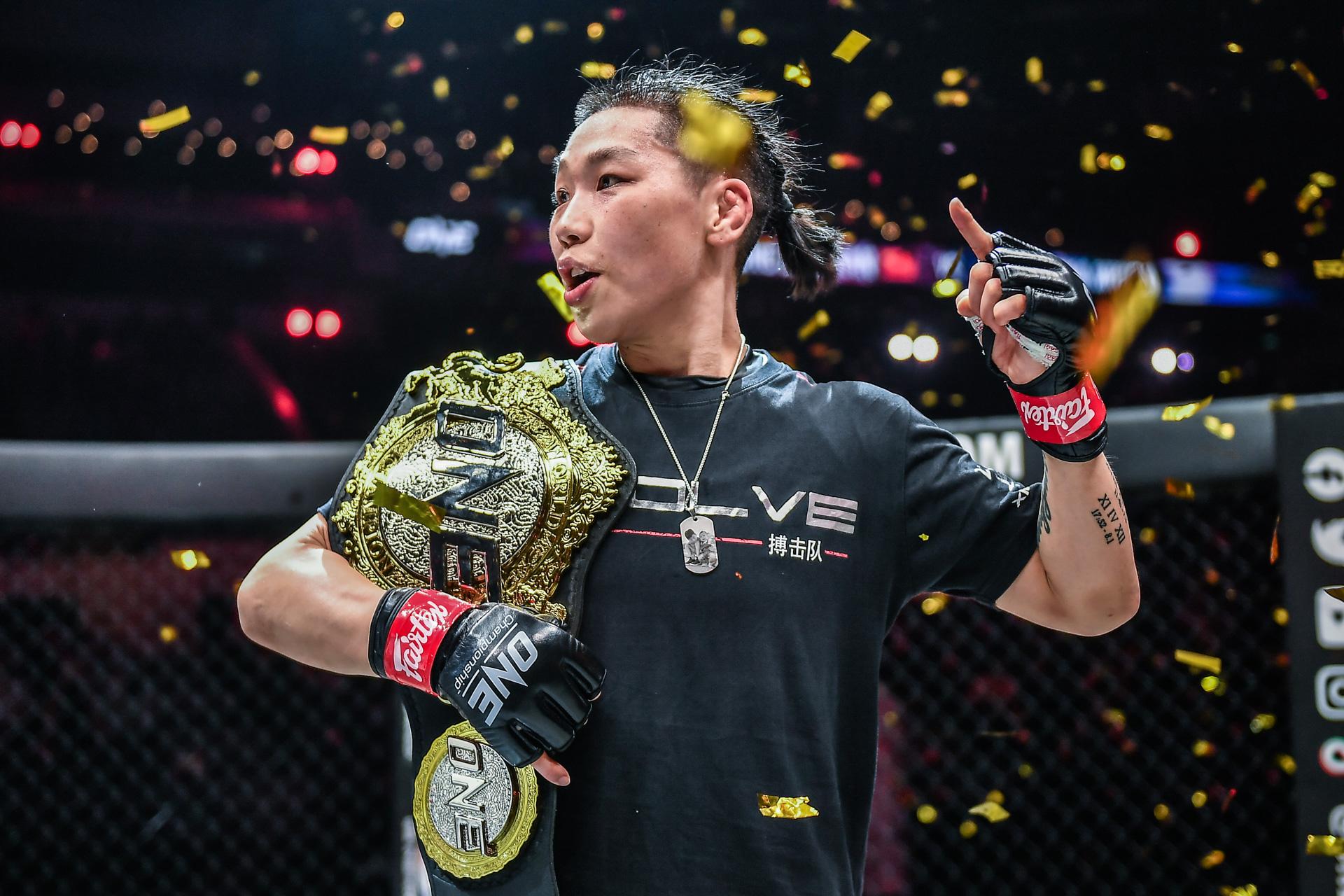 Xiong Jing Nan celebrates her ONE Strawweight World Championship defense at ONE: HEAVY HITTERS.